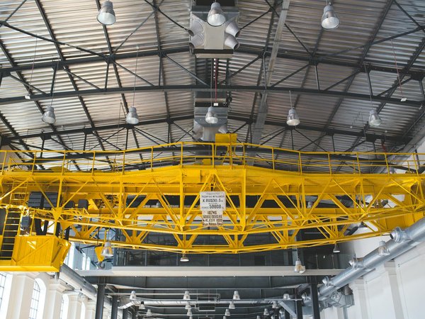 Heavy overhead crane in steel fabrication factory