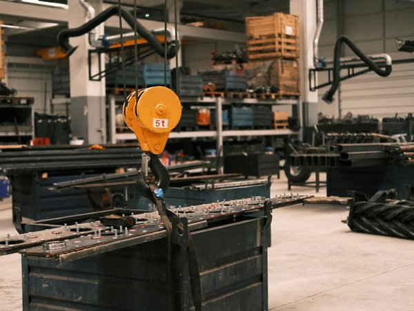 Heavy duty overhead crane in industrial workshop