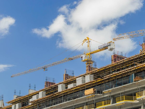 Modern hospital building construction with cranes